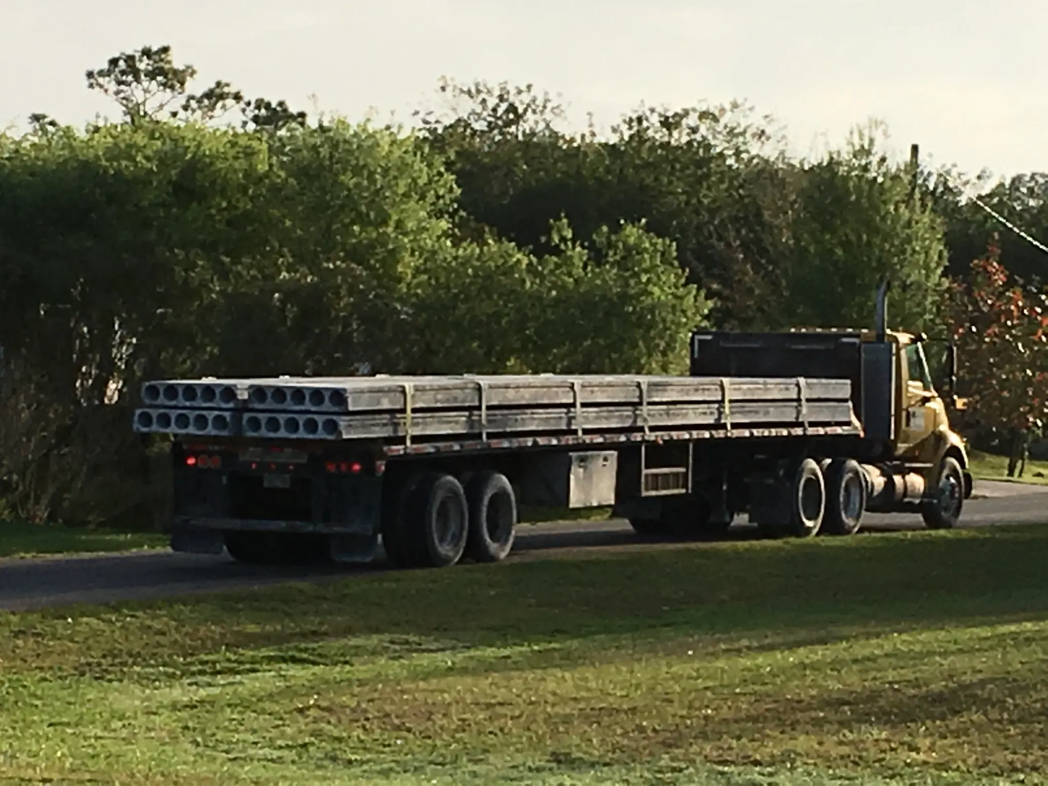 Flatbed truck transporting hollowcore planks
