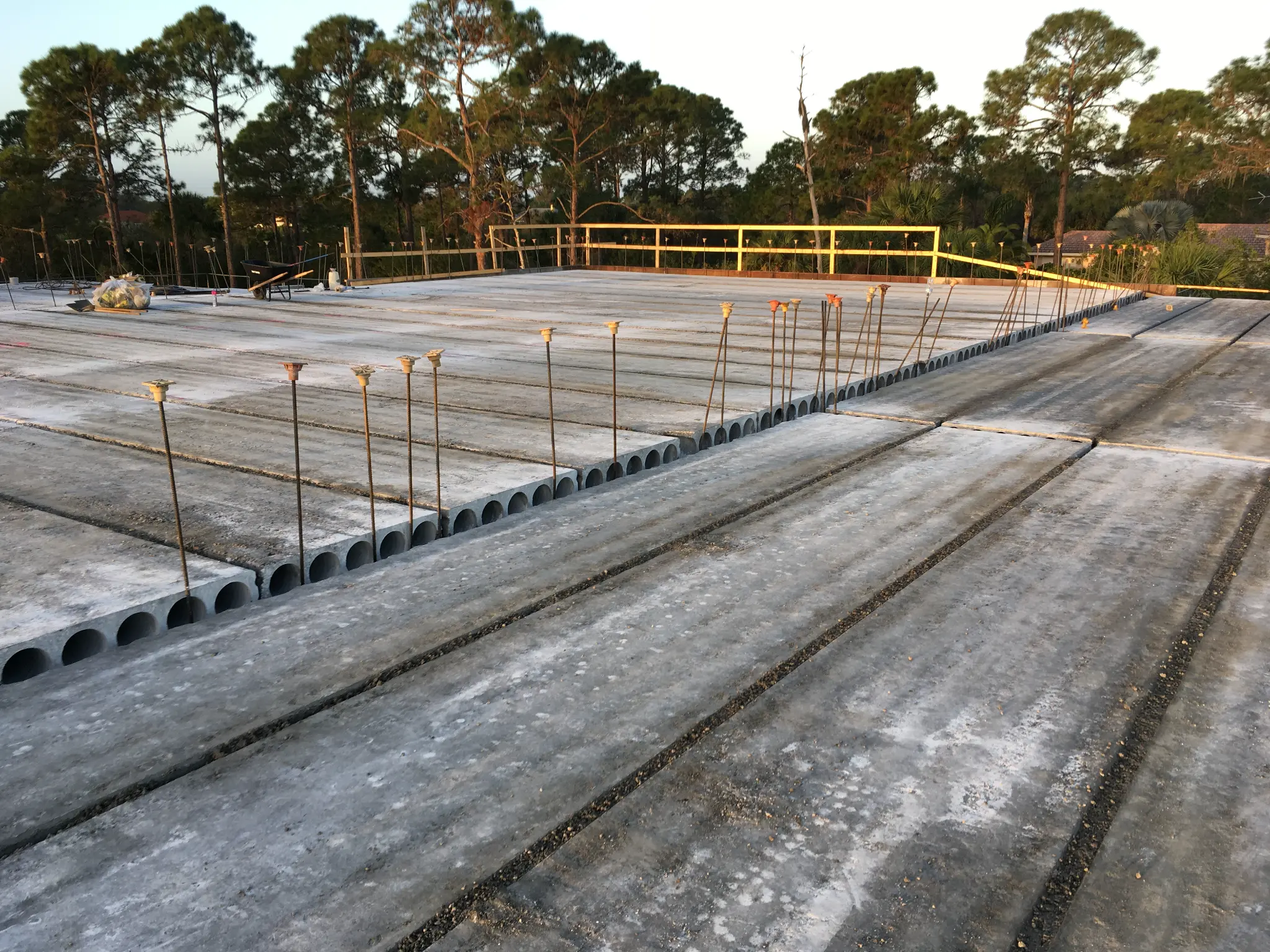 Hollowcore roof deck with rebar sticking up from walls
